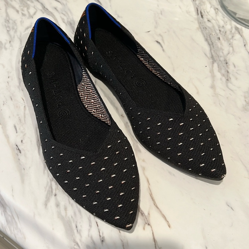 Black and white Rothy’s size 12